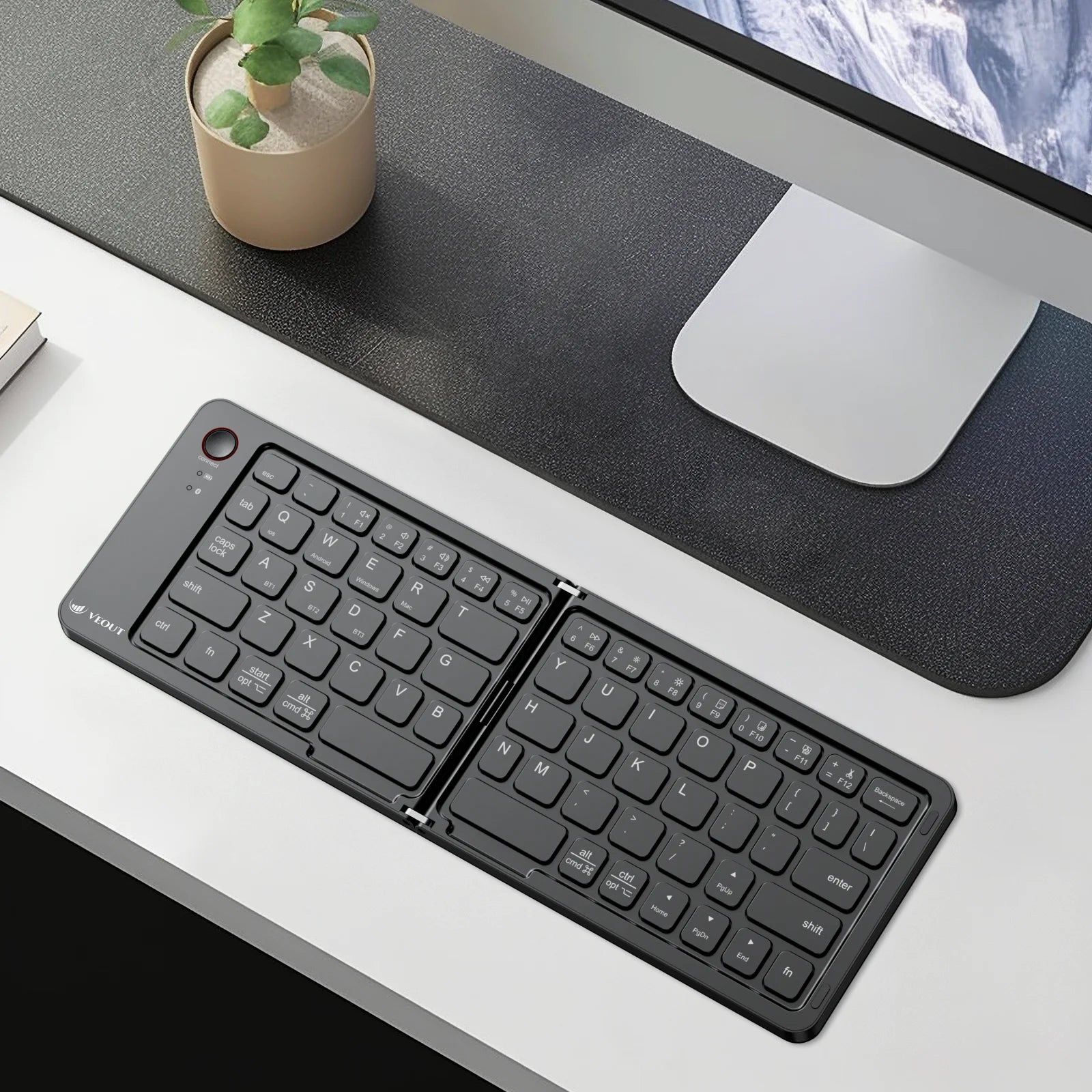 E4 Wireless Folding Keyboard Black White Pink Purple Four Colors Optional Compact Wireless Keyboard for Mobile Devices